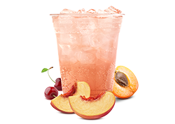Peach punch mocktail made with Sprite, served over ice with peaches, cherries, and nectarines”
