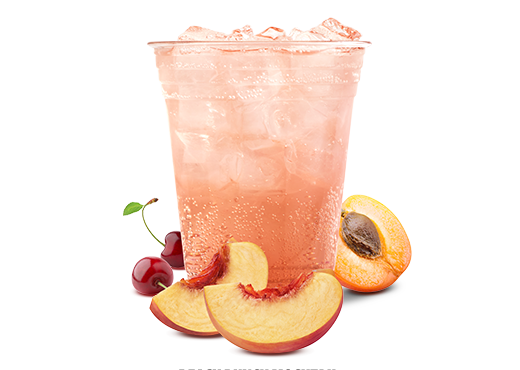 Peach punch mocktail made with Sprite, served over ice with peaches, cherries, and nectarines”